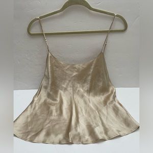 Victoria’s Secret tan silk Cami. Adjustable straps.